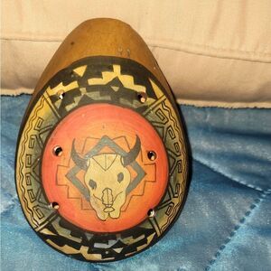 Peruvian Hand-painted clay ocarina, a type of vessel flute.